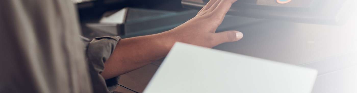 Asian woman preparing to scan a document